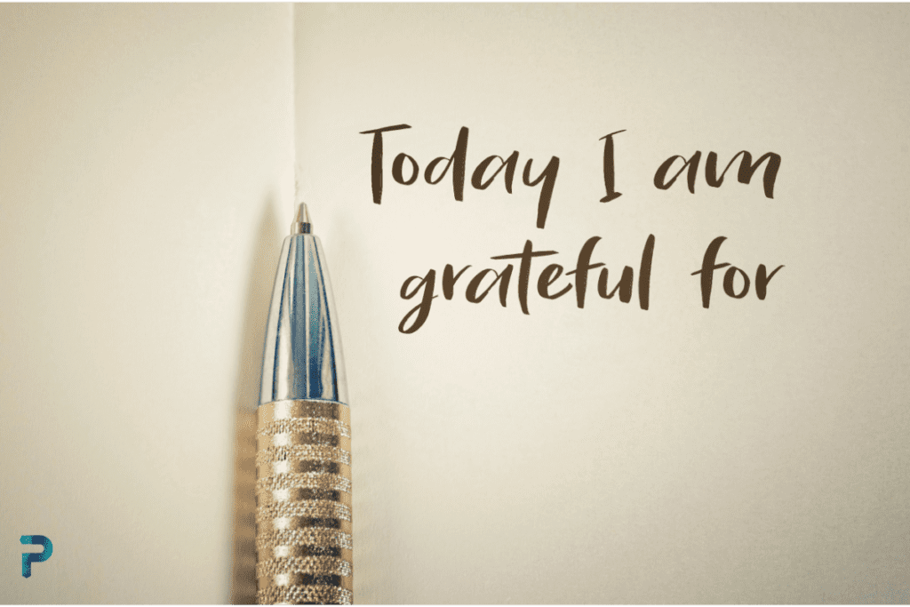 pen and journal with text "today I am grateful for"