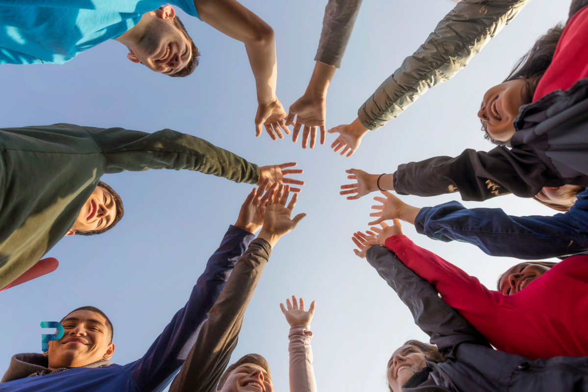 circle of friends joining hands